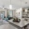 a kitchen with a marble island
