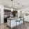 a kitchen with a table and chairs