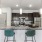 a kitchen with a marble island