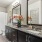a bathroom with a large mirror